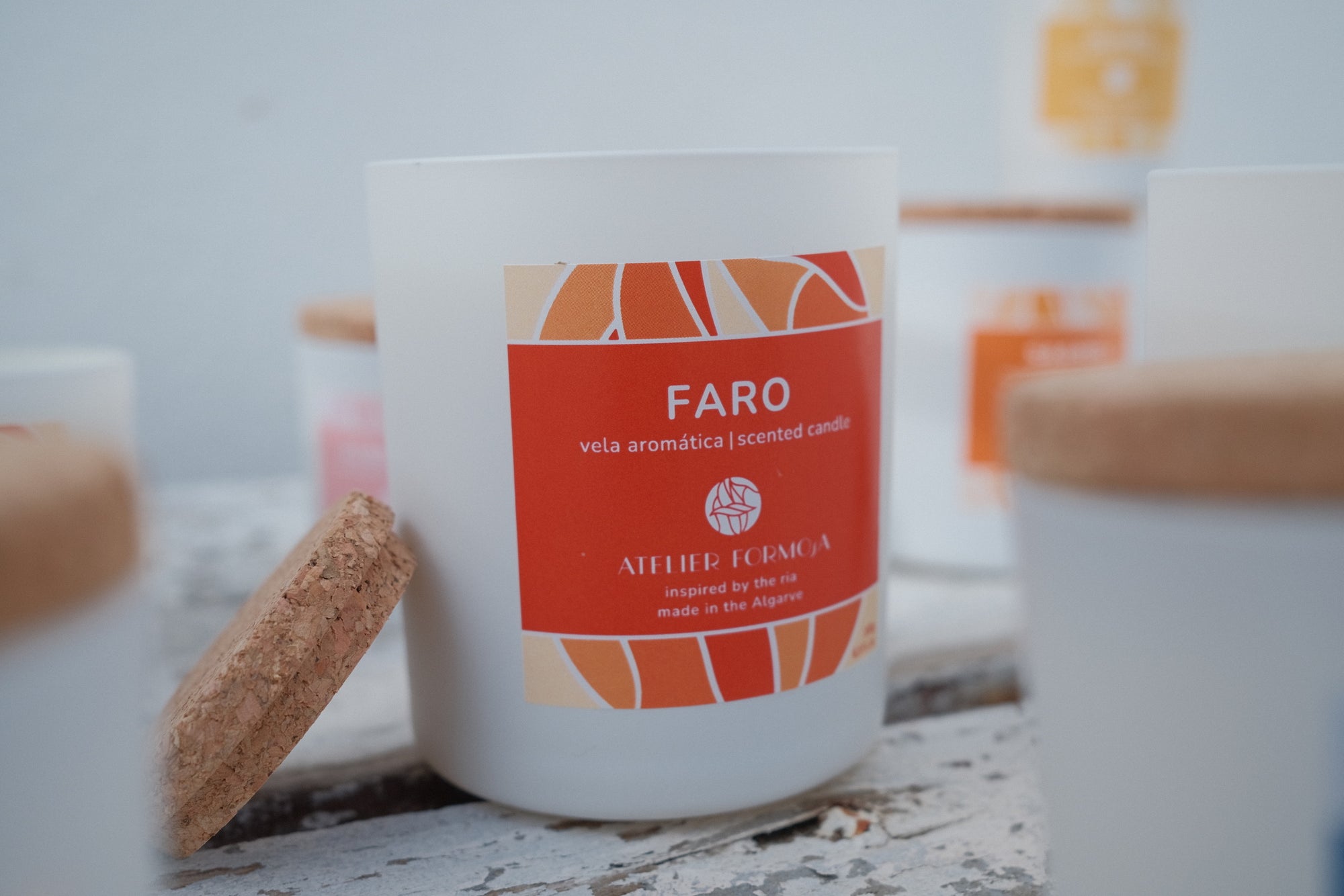 FARO candle styled on a sunny shelf – perfect for adding warmth and summer energy to any room.