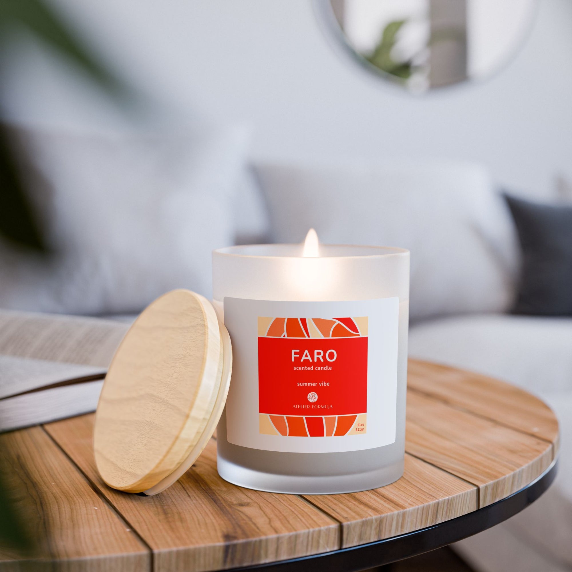 FARO candle placed on a summer table – home decor with a Mediterranean vibe.