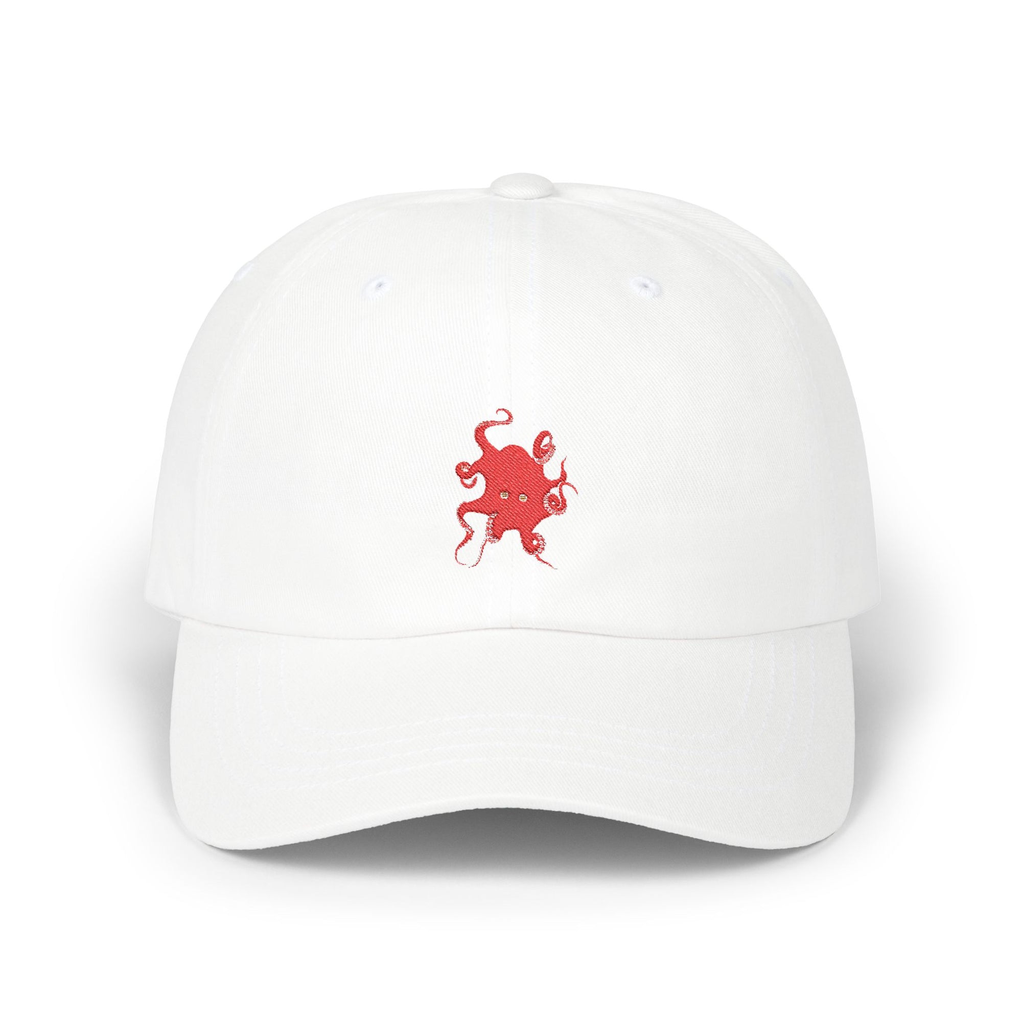 White cap embroidered with red octopus – the official partner of the sun